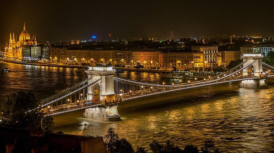 Szechenyi Chain Bridge illuminated at night spanning the Danube River in Budapest